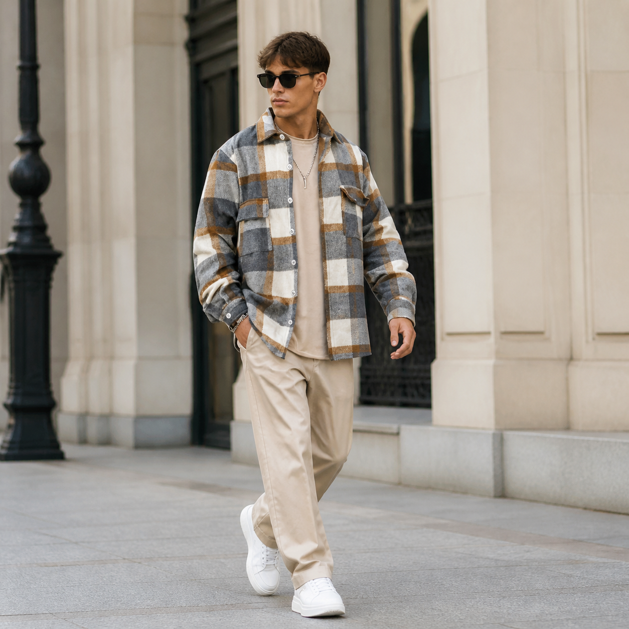 Mixed color plaid overshirt jacket worn outdoors in a walking lifestyle pose.