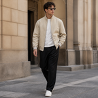 Apricot smooth finish stand collar jacket worn outdoors in a walking lifestyle pose.