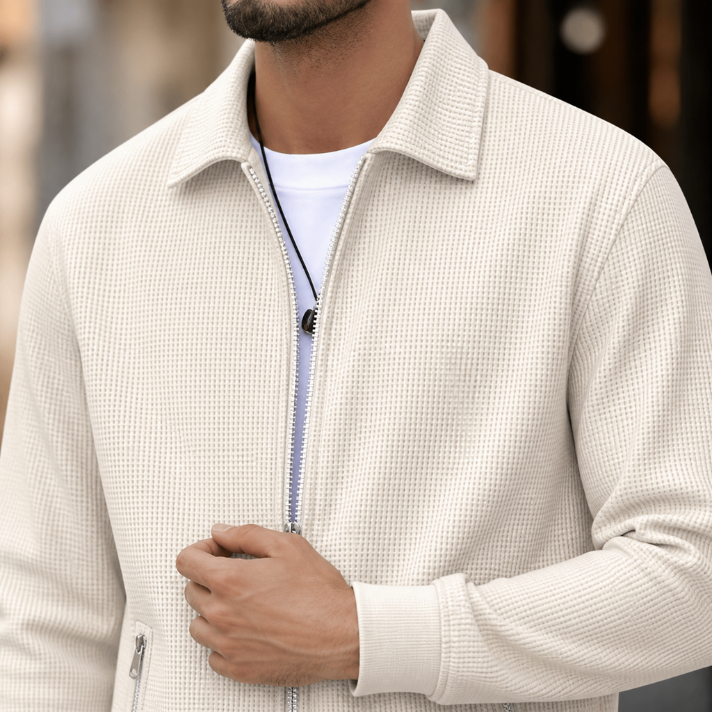 Close-up of the khaki textured casual jacket collar, zipper and waffle knit finish.