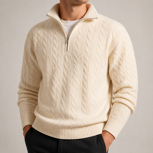 Off white cable knit half zip sweater on a male model in a clean studio.