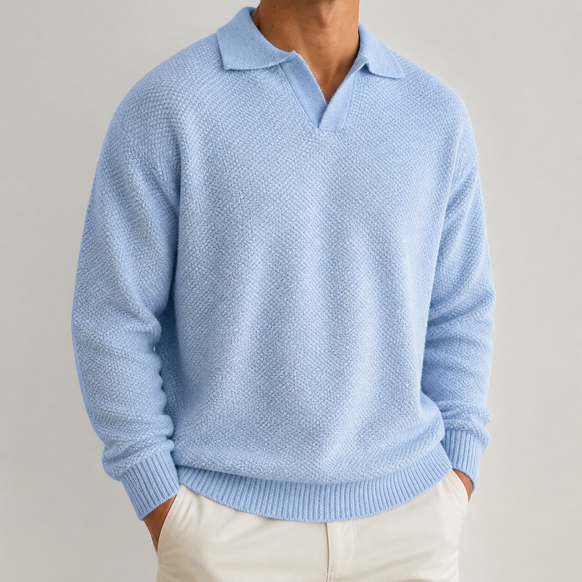 Light blue textured polo collar sweater on a male model in a clean studio.