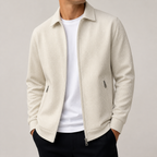 Khaki waffle textured casual zip jacket on a male model in a clean studio.
